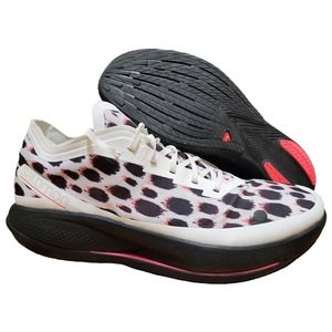 Salomon White and Black Athletic Shoes with Pink Accents